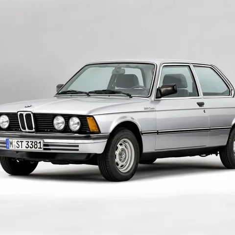 Silver BMW E21 3 Series two-door saloon, studio front three-quarter shot