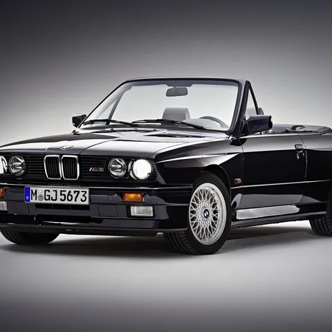 Black BMW E30 M3 Convertible with the top down, studio shot