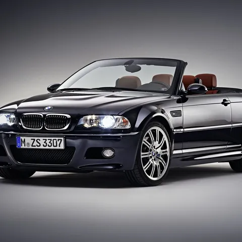 Silver BMW E46 M3 Convertible with the top down, studio shot