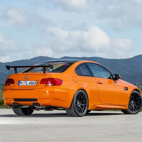 Fire Orange BMW E92 M3 GTS coupé, rear three-quarter view